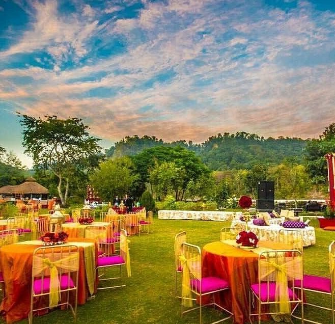 An image of an outdoor seating arrangement decorated with flowers