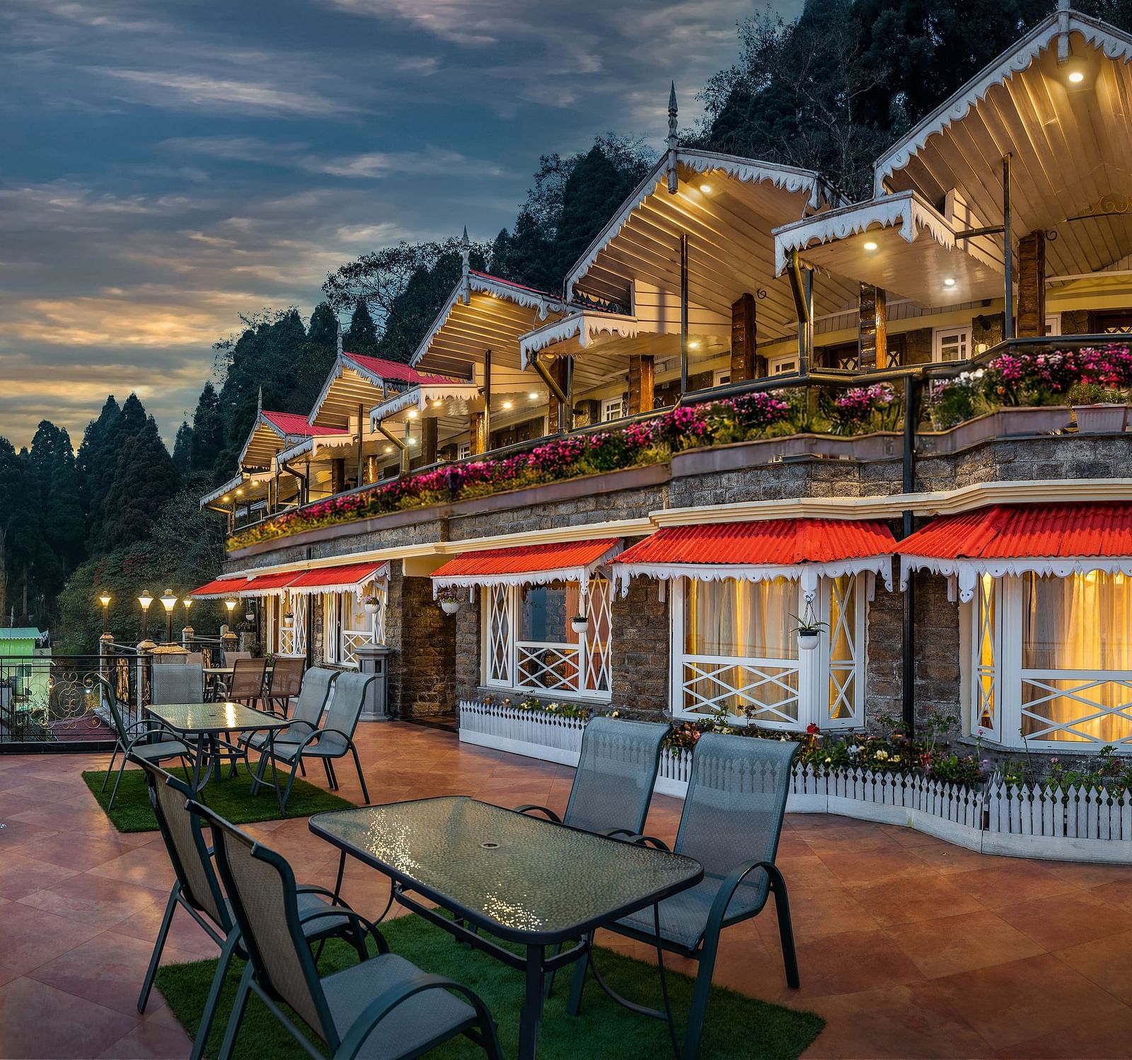 Facade of Summit Grace Boutique Hotel & Spa, Darjeeling with seating area outside.