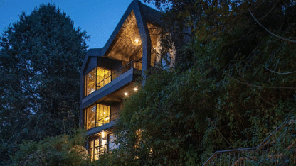 A sneak peak of cottage which is set around the trees | Kavya Resort and Spa, Nagarkot
