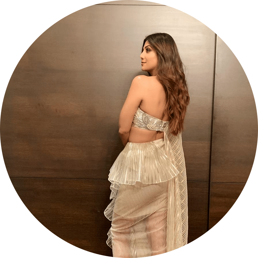 I love the hair services at IOSIS says Shilpa Shetty posing for a picture 