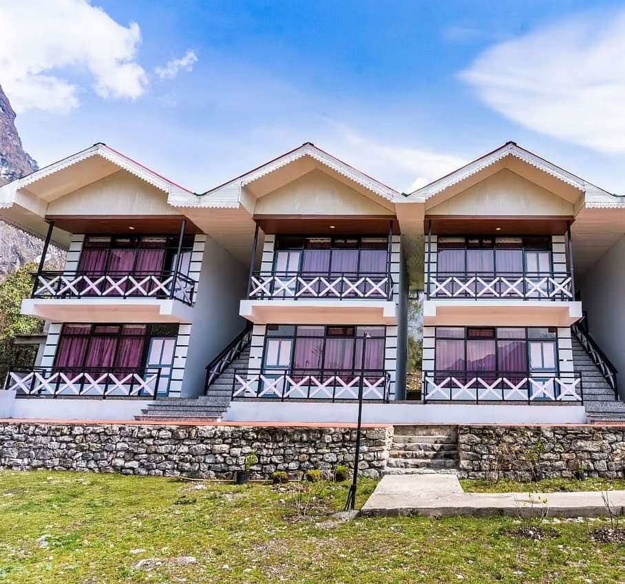 Facade of Whispering Pines By Summit, Lachung, featuring a charming garden in front and a bright