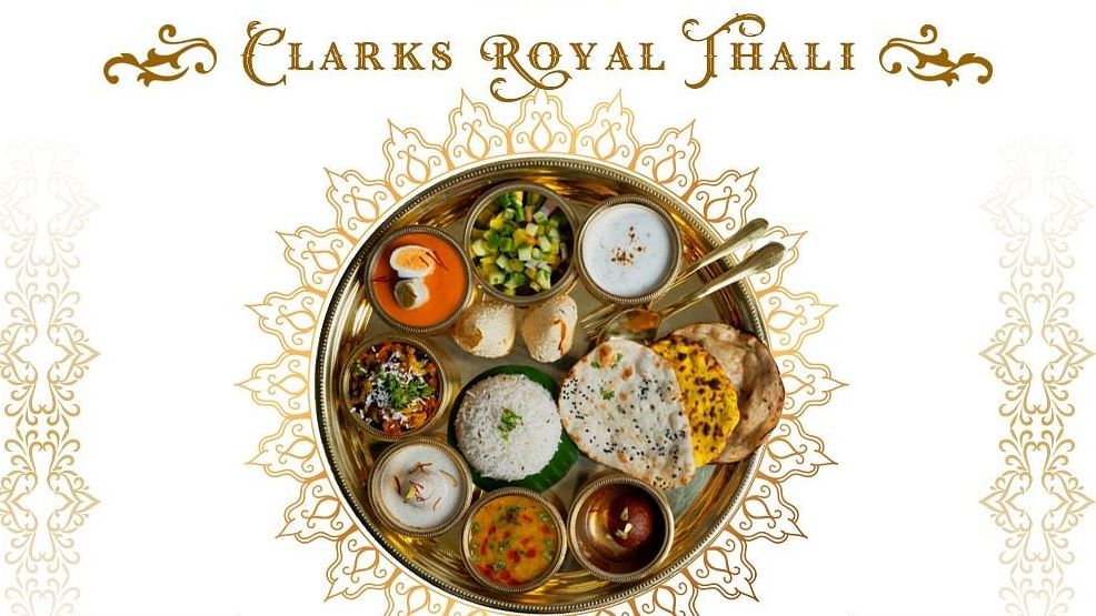 a creative of the thali offered at Clarks Khajuraho