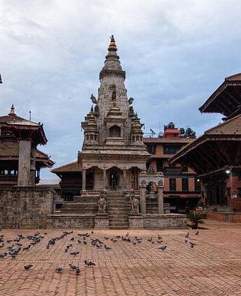The bhaktapur durbar square with a clear sky in the background