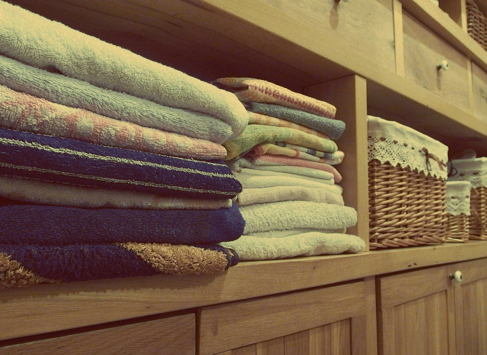 Image of freshly washed clothed arranged in the rack.