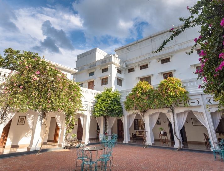 Another view of the hall Sehan with trees in view - Saraca Hotel Lucknow.
