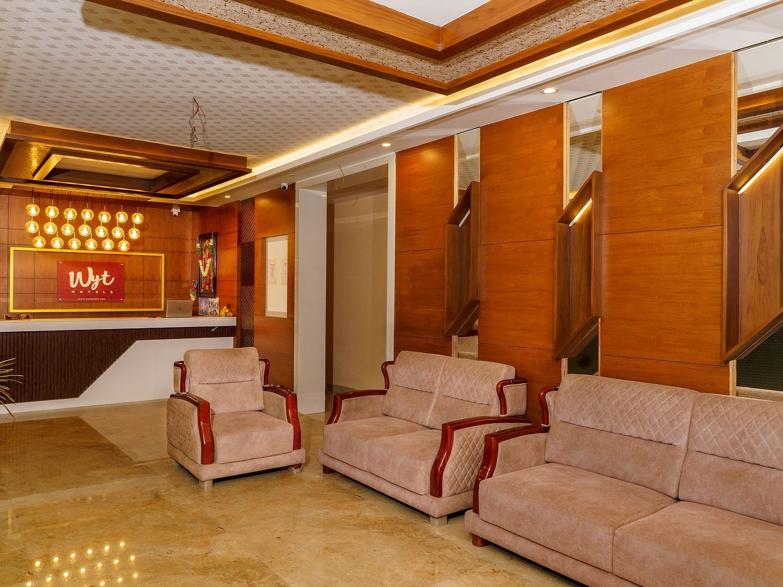 Side view of lobby with sofas at Wyt Hotels, Rameswaram 
