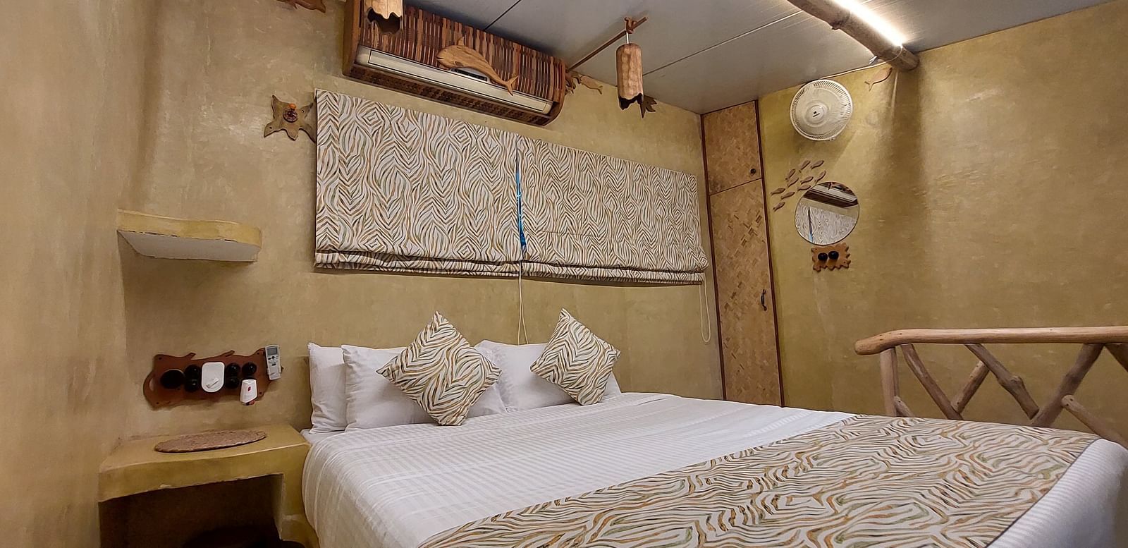 Bed with bedding in the room | Matsya Island Retreat