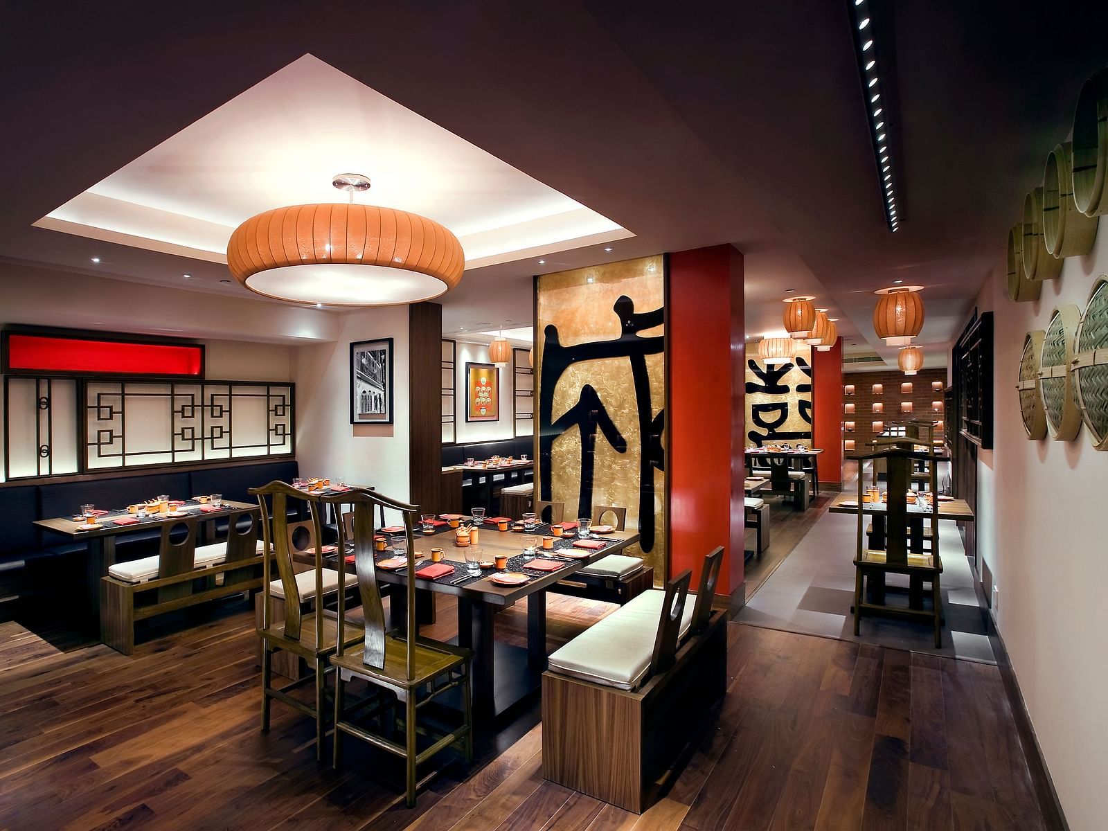 An overview of the interior of the in-house restaurant with chairs and tables - The Raintree, St. Mary's Road.