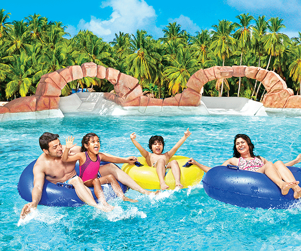 a family on float tubes at Water Kingdom