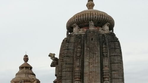 Ancient stone temple complex with intricately carved towers and sanctuaries.