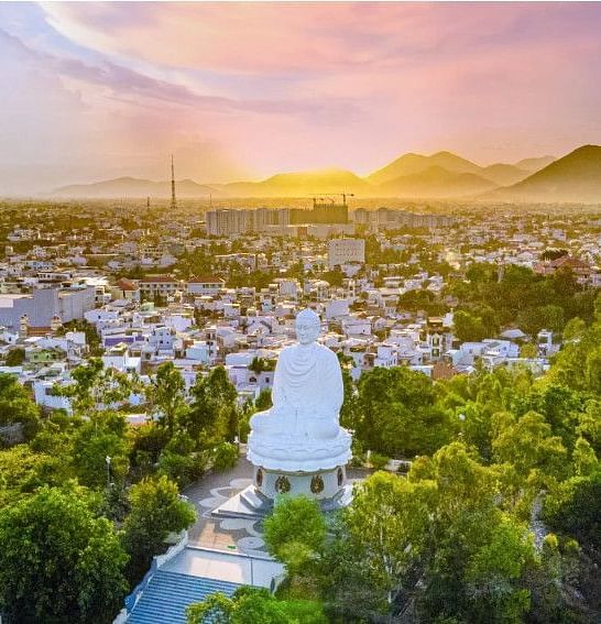 An aerial view of a city that has several trees, buildings and structures - Alibu Resort Nha Thrang
