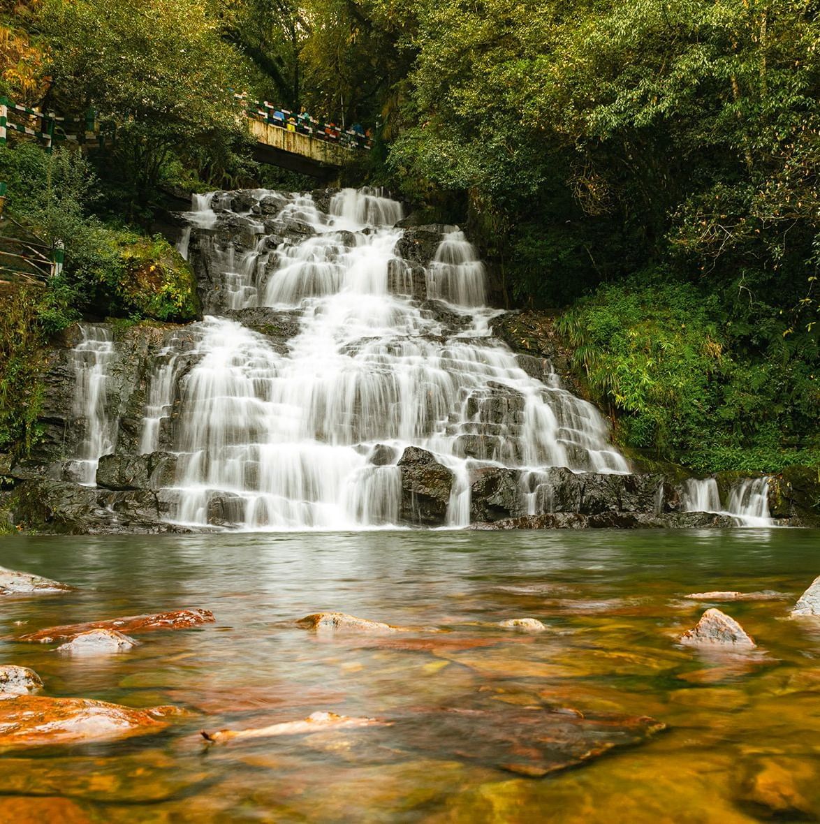 A view of the majestic Elephant Falls, one of the many breathtaking natural attractions near the Polo Hotel Shillong.