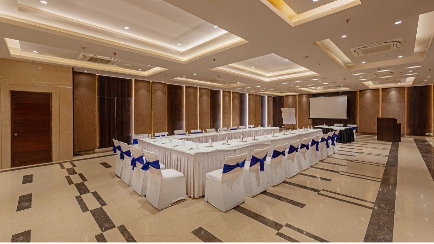 Spacious banquet hall set up for a meeting at Hotel Saket 27