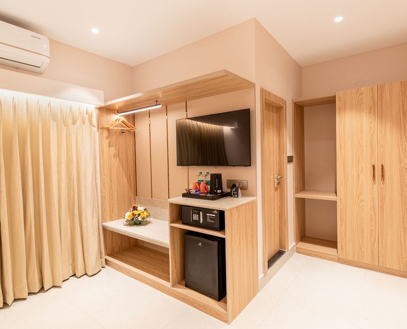 Kitchenette and wardrobe view of The Premium Rooms at TGI Livancia The Sojourn, Bangalore.