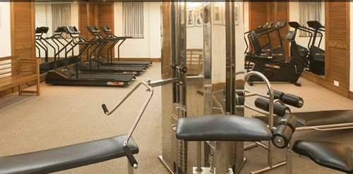 An overview of the The Retreat Club with many fitness equipments at The Retreat Hotel and Convention Centre, Madh Island