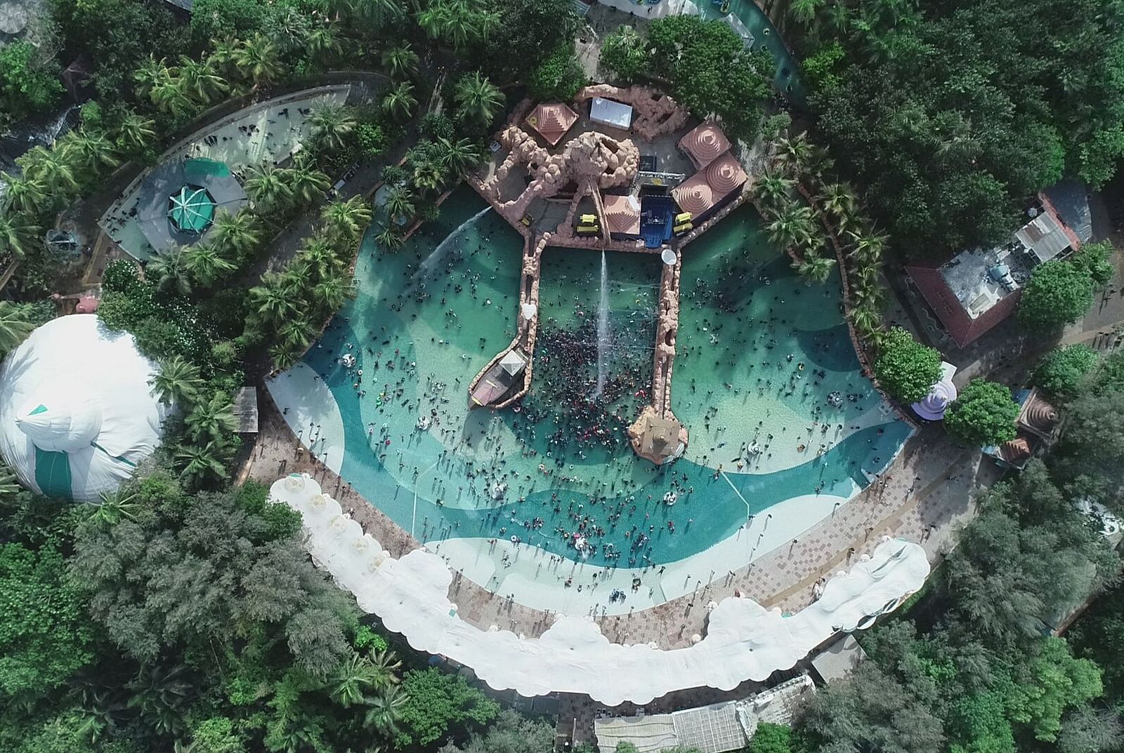 An aerial view of Aquadrome at Water Kingdom amidst greenery