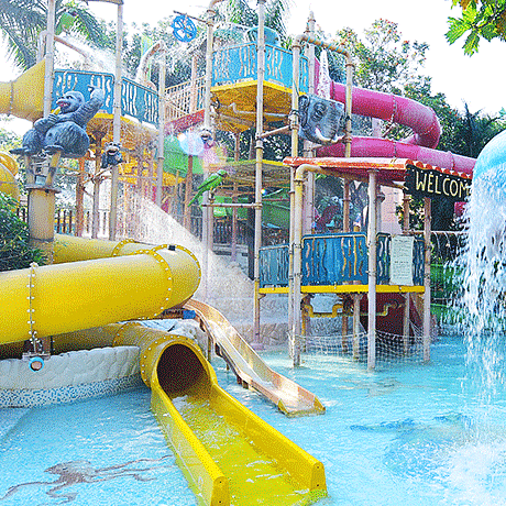 Water Kingdom - view of the WATERFALLS UMBRELLAS ELEPHANT TILTING BUCKET at our water park
