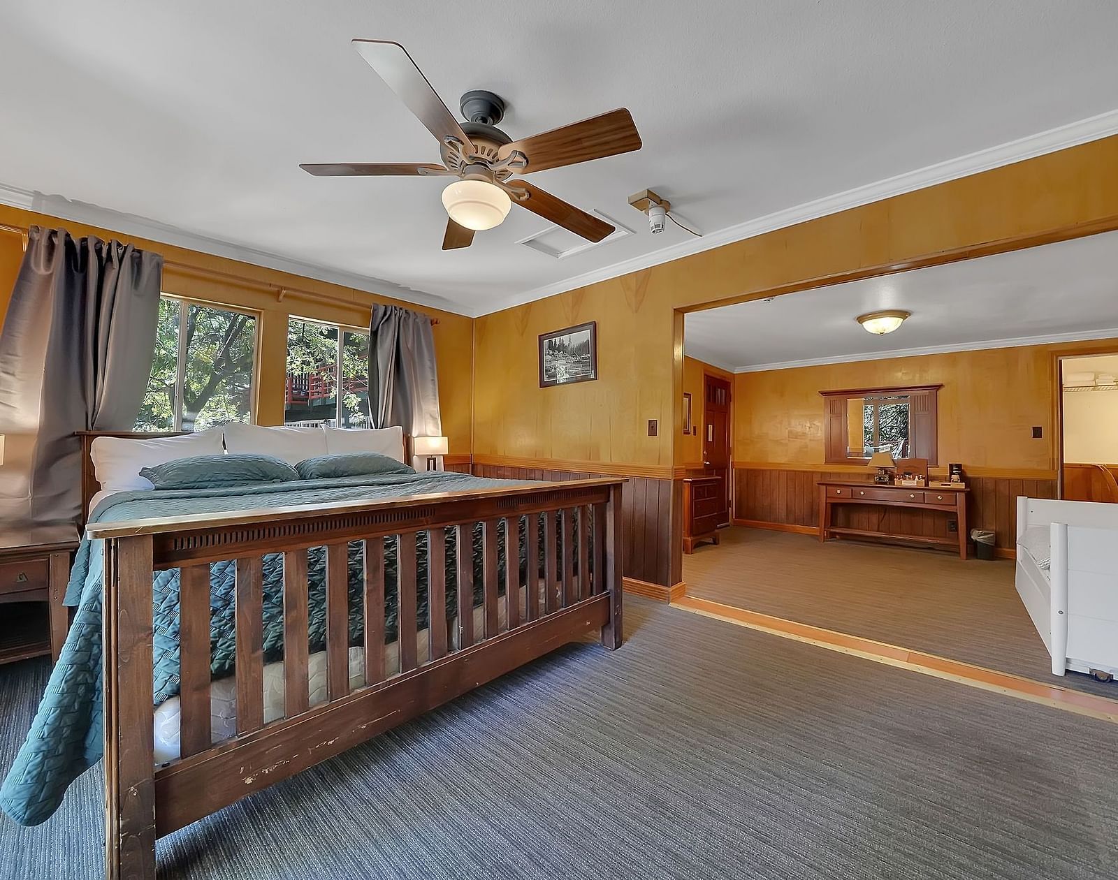 A view of a room at Narrow Gauge Inn with a double bed.