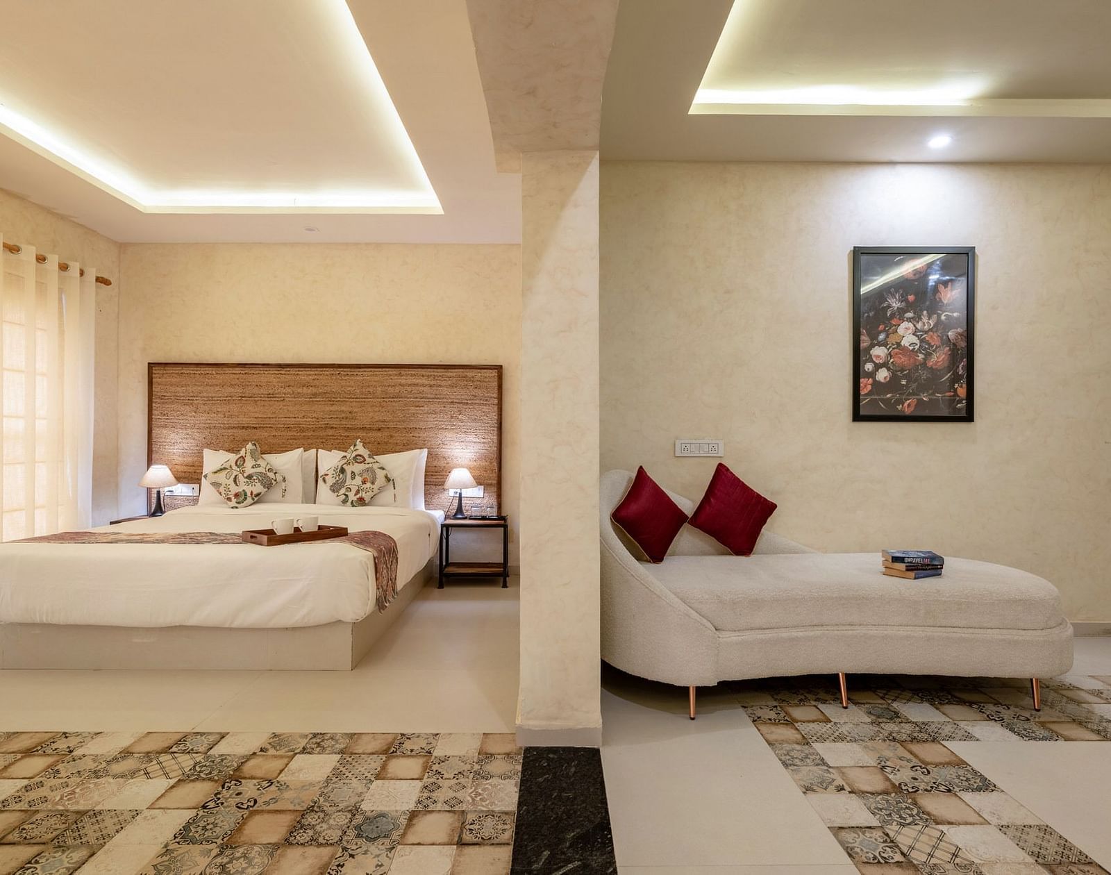 A room with a bed on one side and a sofa on the other side at Valley by Grassfield.
