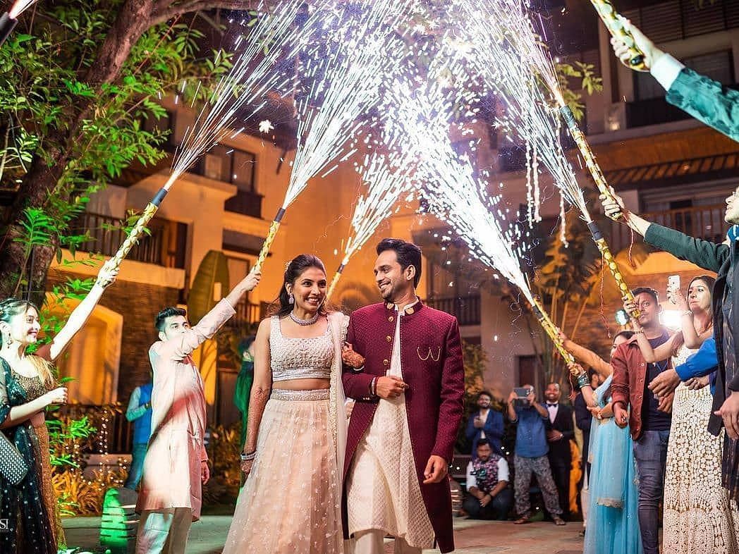 Happy couple during a wedding ceremony - Rhythm Lonavala