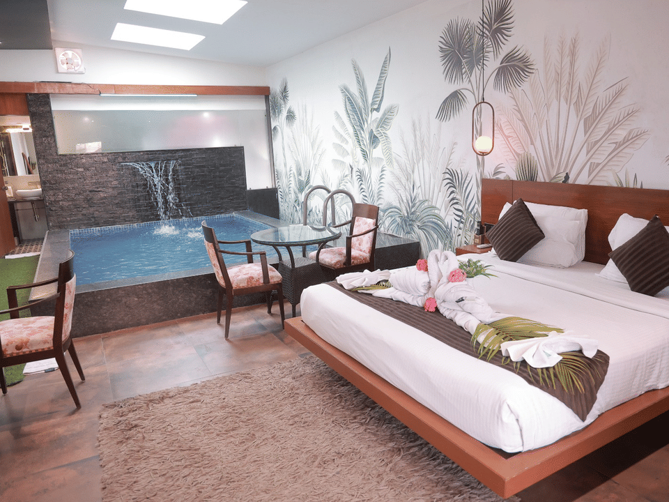 Skyline by Miraya, King Room, Bed beside the private plunge pool