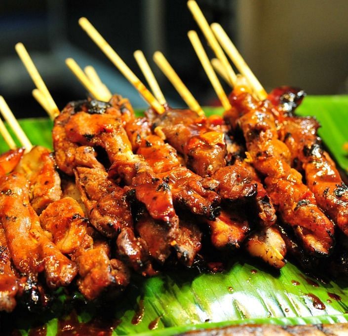 An image of a roasted chicken placed on banana leaf - The Earl s Court Nainital o9du1d