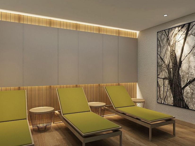 Reclining chairs in the spa at Cloud 9 Sarovar Premiere, Goa, offering a comfortable and soothing space for relaxation