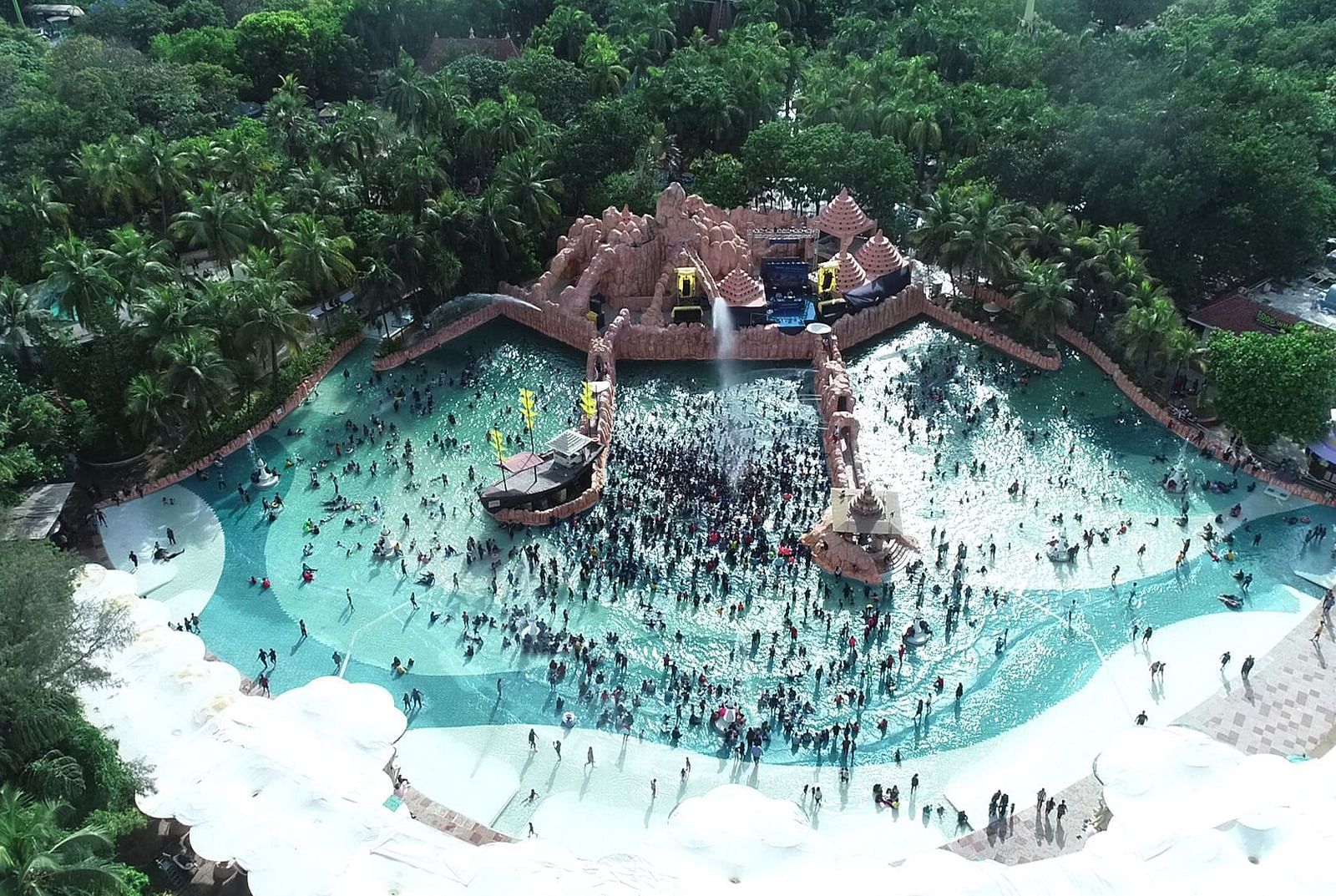 A drone shot of the Wetlantic wave pool where a huge crowd is seen enjoying - Water Kingdom.