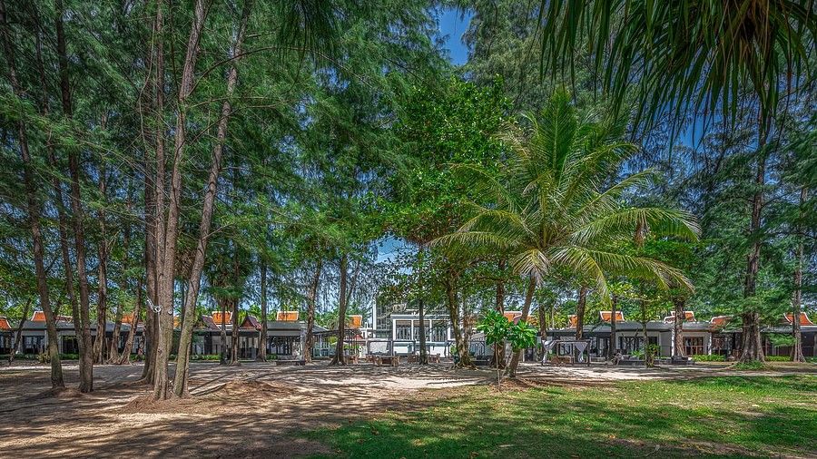 a panoramic image showcasing the villas tucked away in lush  green canopy - Maikhao Dream Villa Resort & Spa, Phuket