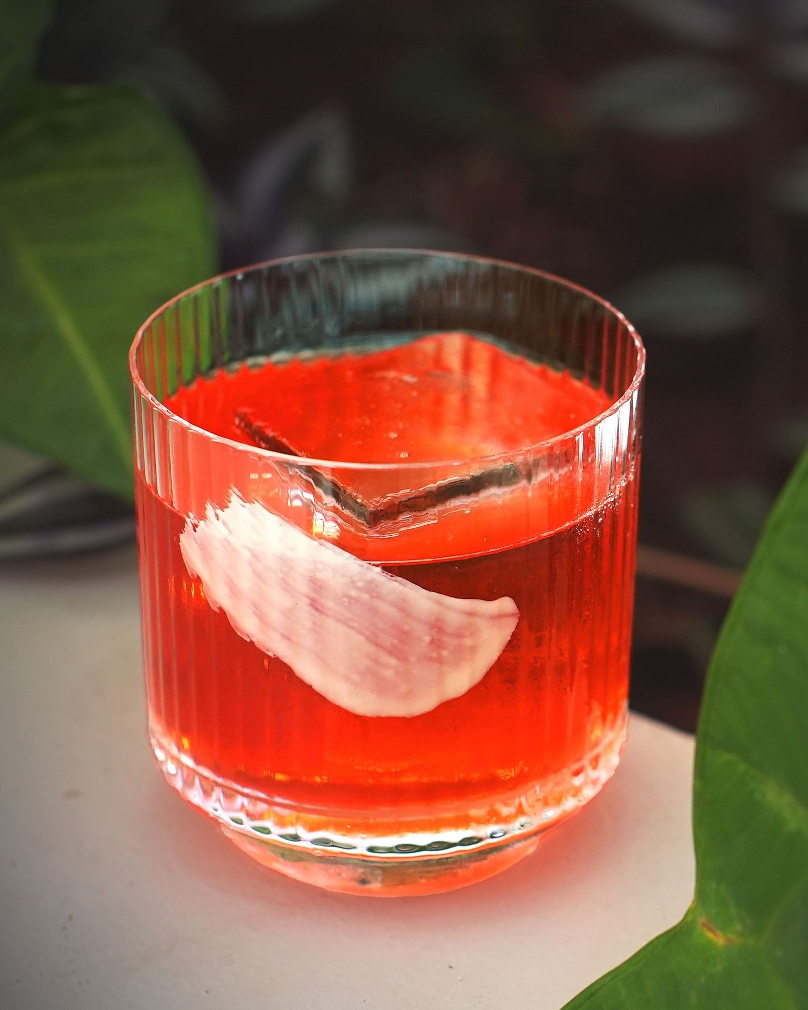 Bubble Butt drink with leaves on the side