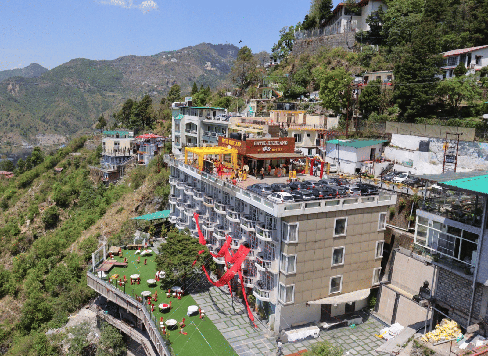 Aerial view of the resort's event spaces overlooking the Himalayan landscape in Mussoorie.