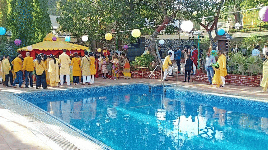 people enjoying by the swimming pool - Zara's Resort  1