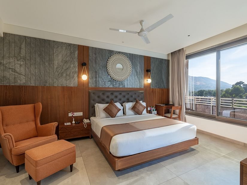 view of a king size bed of Superior Room at Stone Wood Hotel, Kumbhalgarh
