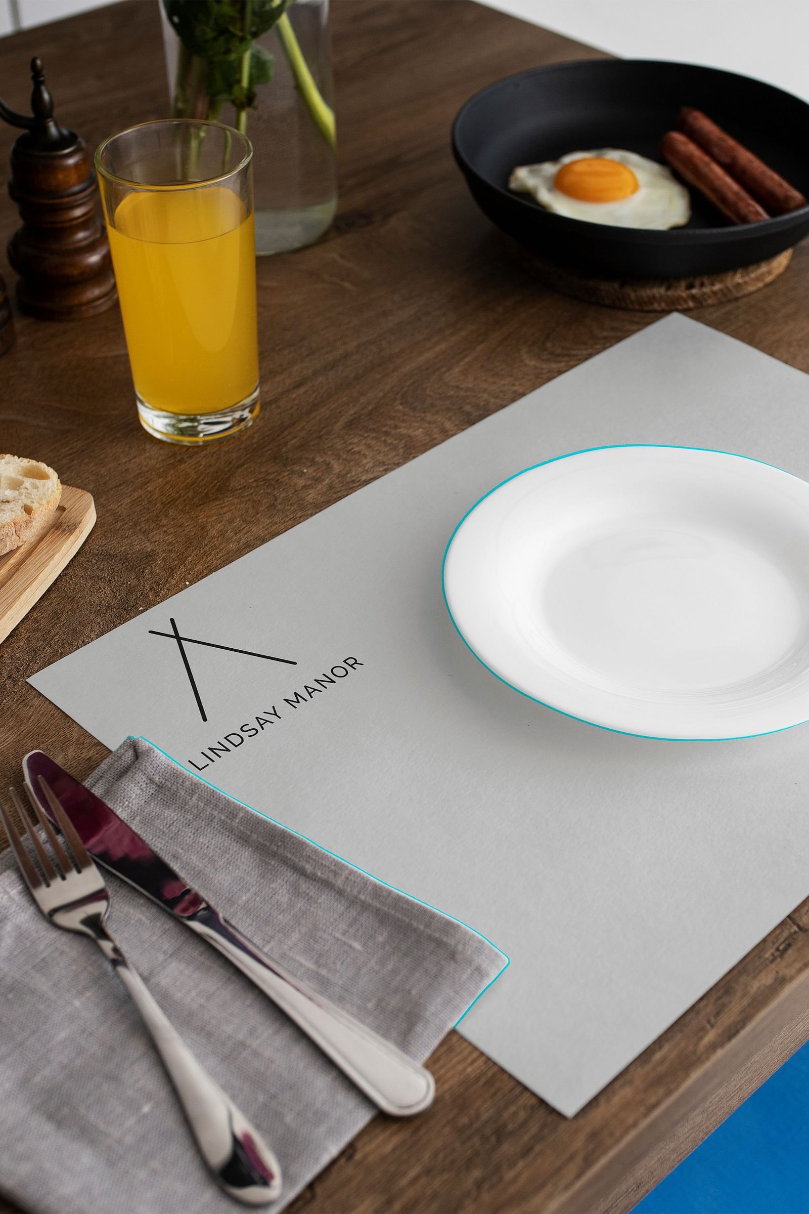 An image of a table where a plate and cutlery is placed - Lindsay Manor, Vagator