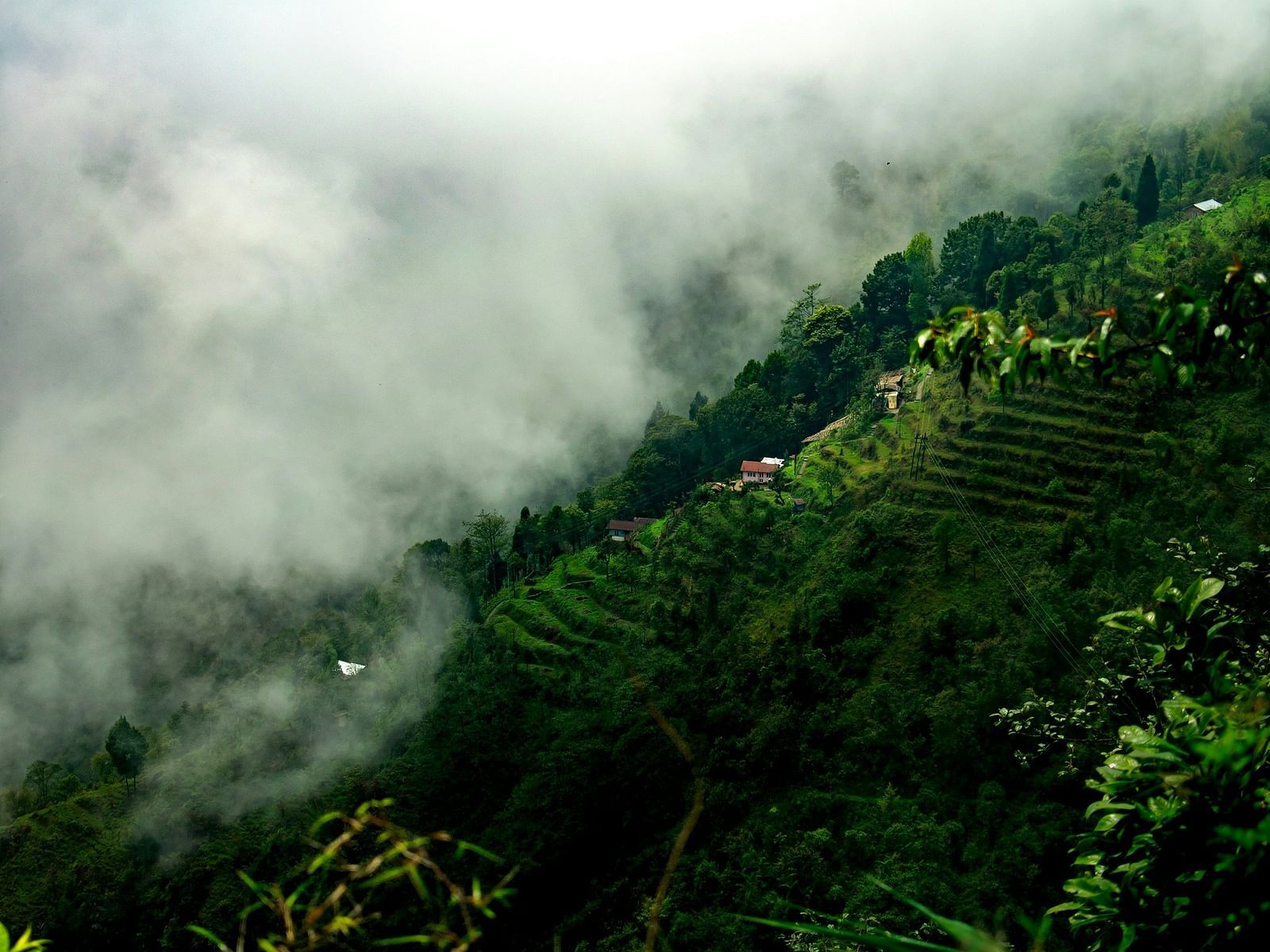 Aerial view of misty mountains.