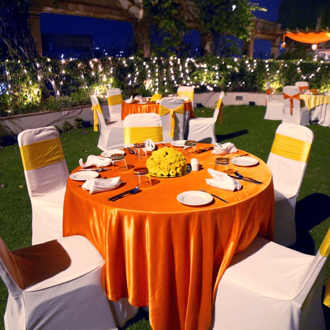 An outdoor space with decorated chairs and tables at The Bristol Hotel