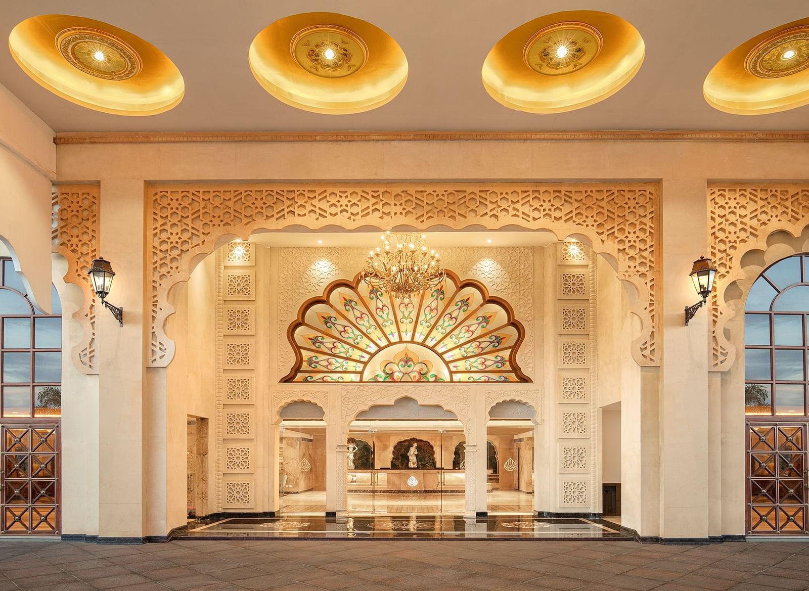 The elegant entrance to our palace with chandeliers and intricate decor - Kaldan Samudhra Palace