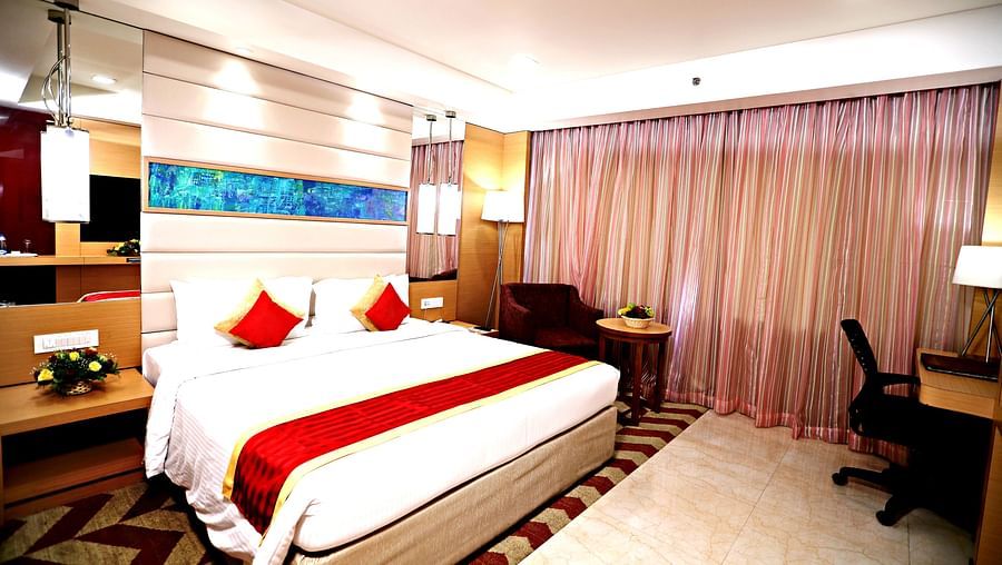 a king size bed offered at Premium Room in Vizag