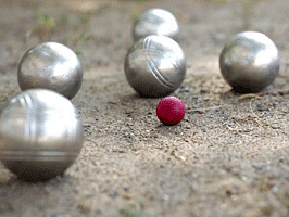balls kept on the ground for a game of Petanque - Buena Vista Luxury Garden Spa Resort