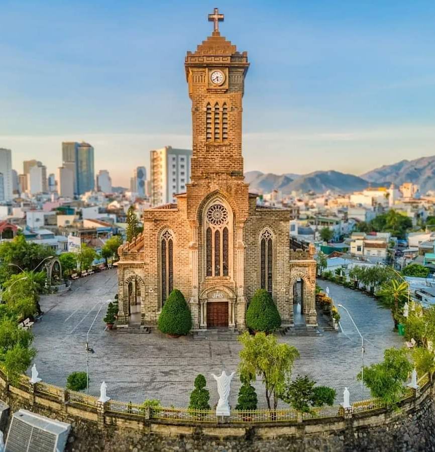 An image of a church surrounded by some trees- Alibu Resort Nha Thrang