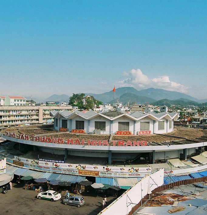 An image of a market that is three storey round building - Alibu Resort Nha Thrang