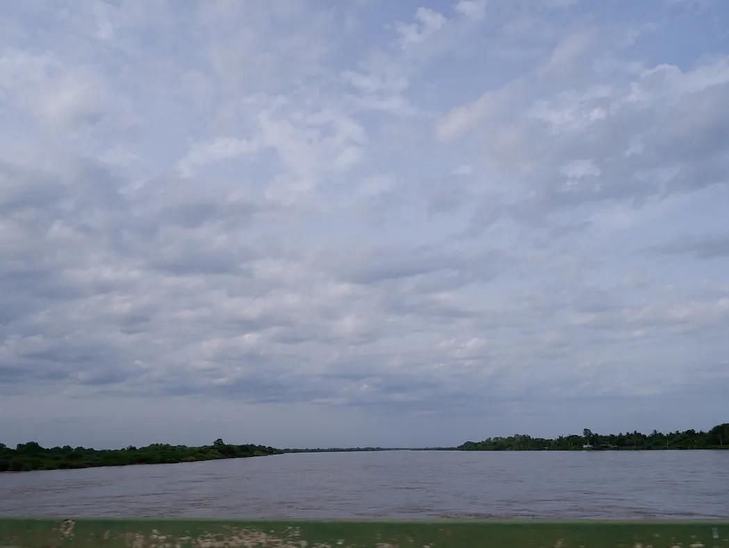 Anaikarai river view and cloudy sky near Dharasuram, blending nature and heritage