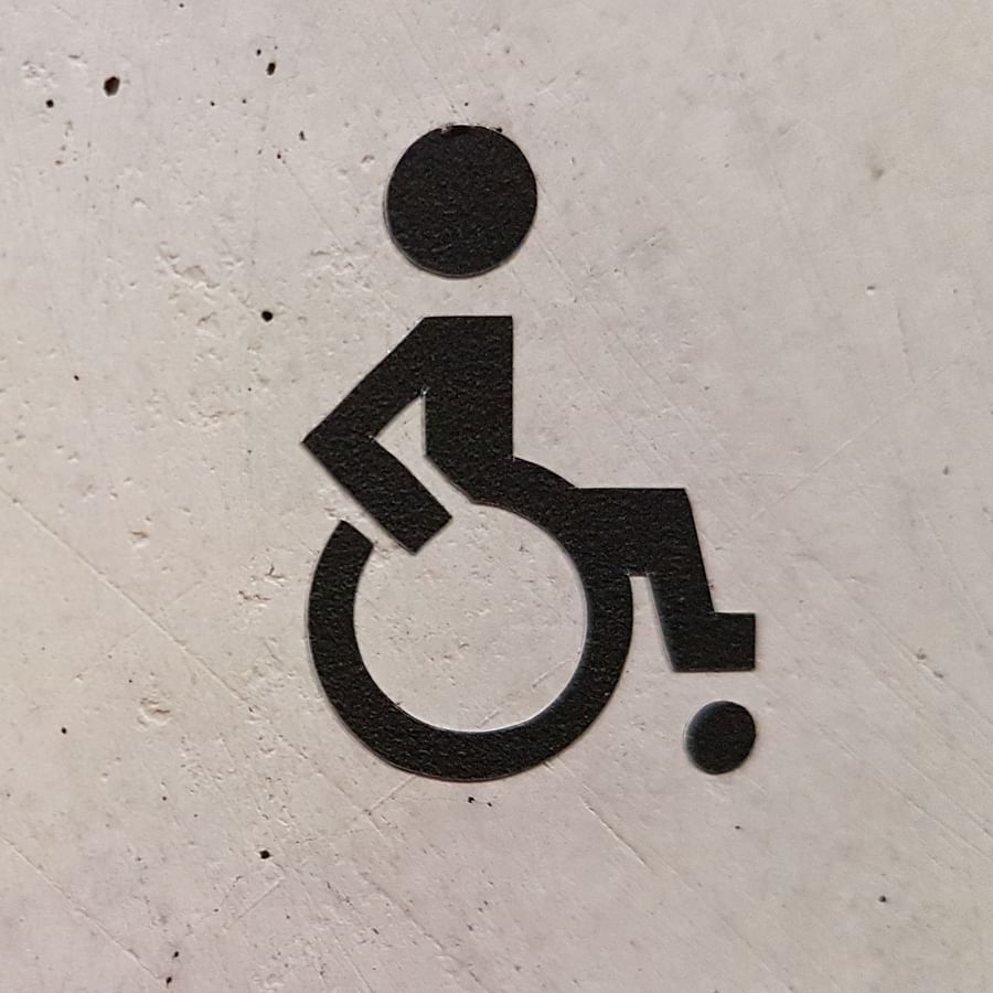 wheelchair sign on a wall