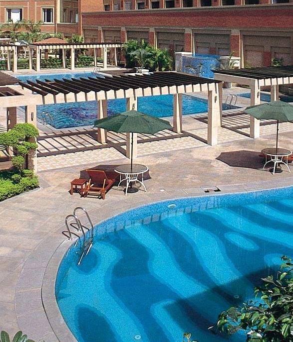 Aerial view of a swimming pool at Nirvana Luxury Hotel, Ludhiana.