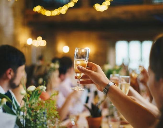 People raising a toast at an event