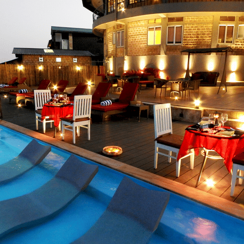 sitting arrangement by the swimming pool