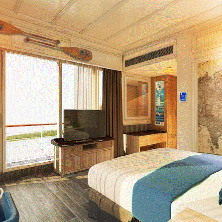 Bright coastal themed bedroom with ocean view