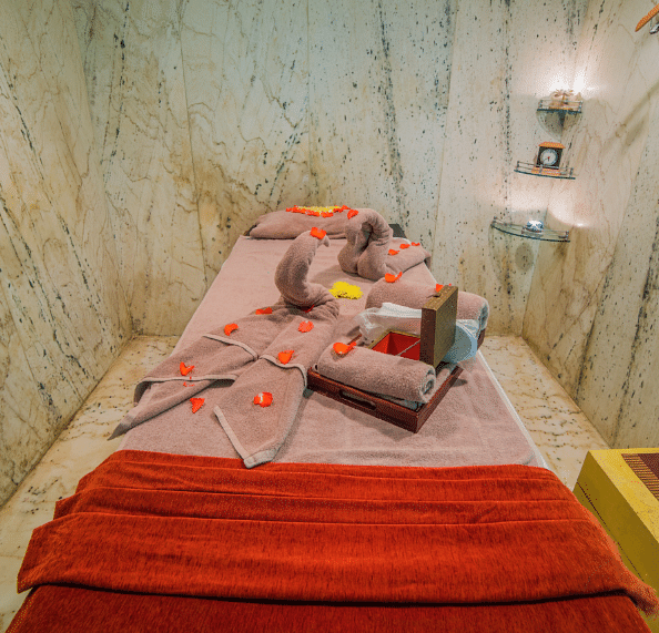 Massage table in a room at Sitara Luxury Hotel in Hyderabad near Ramoji Film City