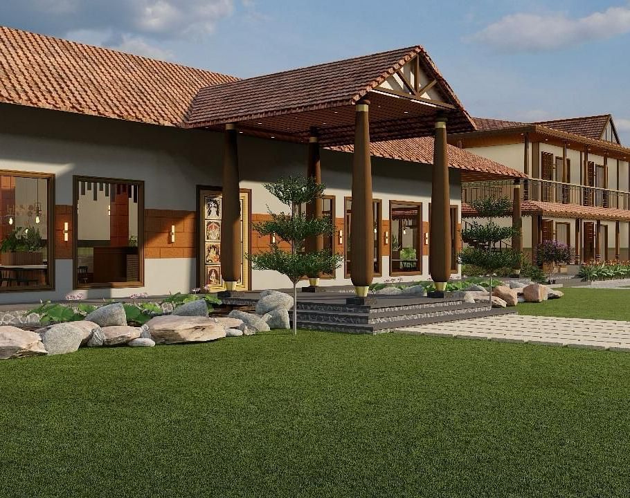 Exterior front view of a resort building with a lawn | Ayana Resorts & Convention, Hyderabad