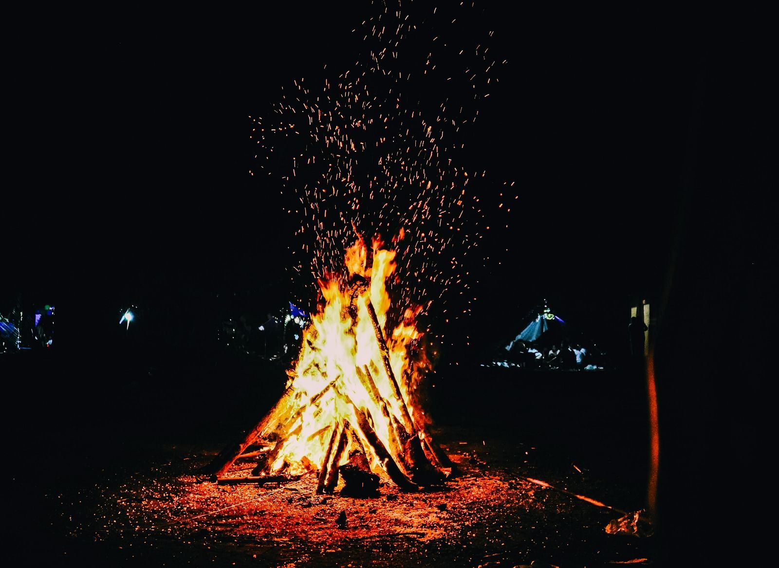 View of bonfire on a dark night.